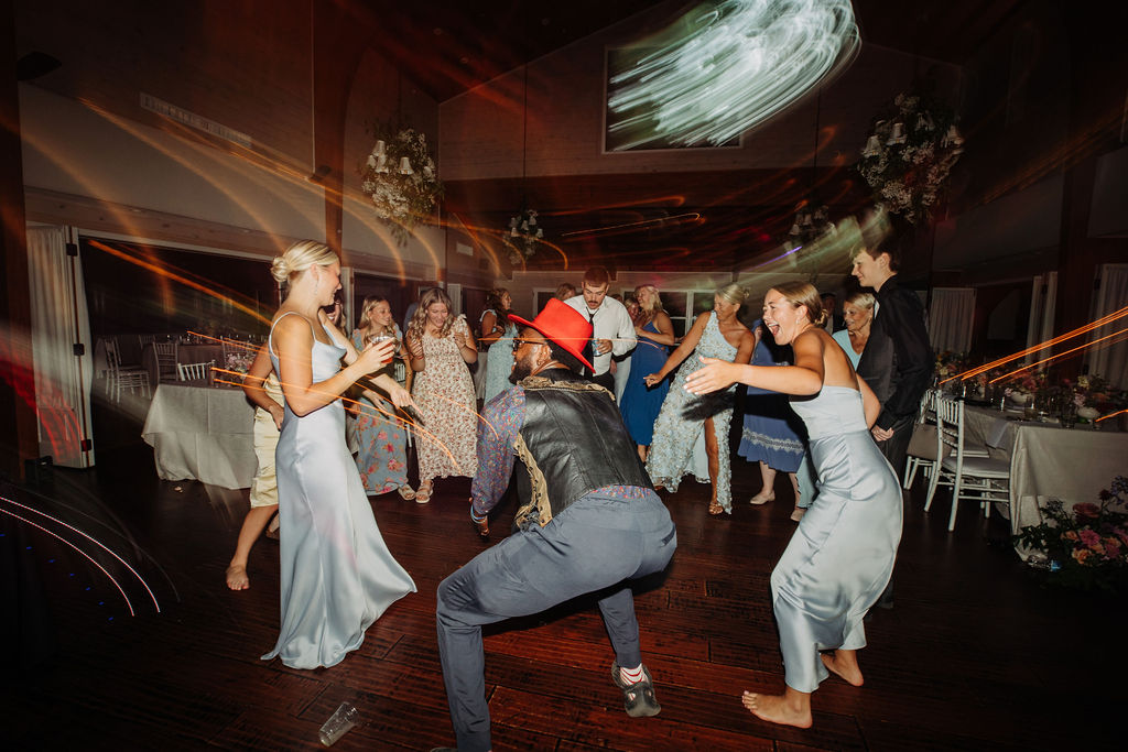 Guests on the dance floor with Kuhl Entertainment Djing the party in the White Oak Dining Room. Photography by Katie Ricard